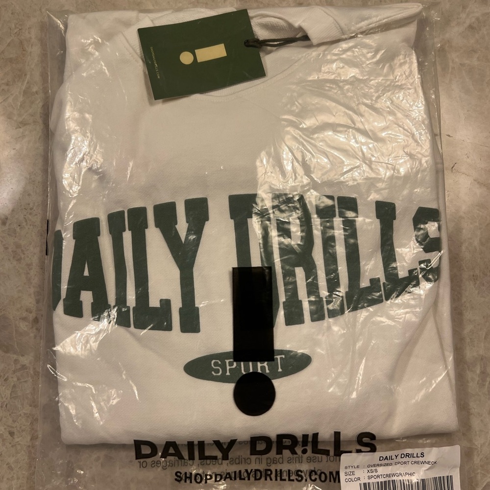 NWT DAILY DRILLS oversized sports crewneck- never opened